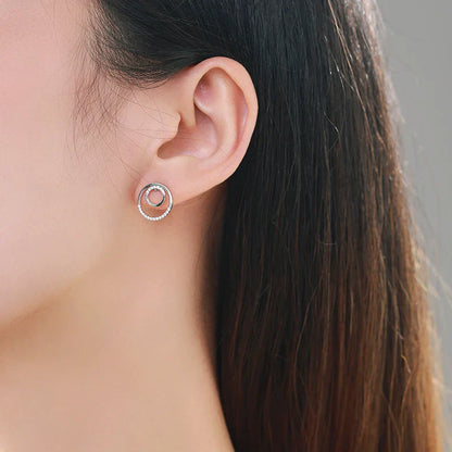 Puces d'oreilles scintillantes en forme de cercle